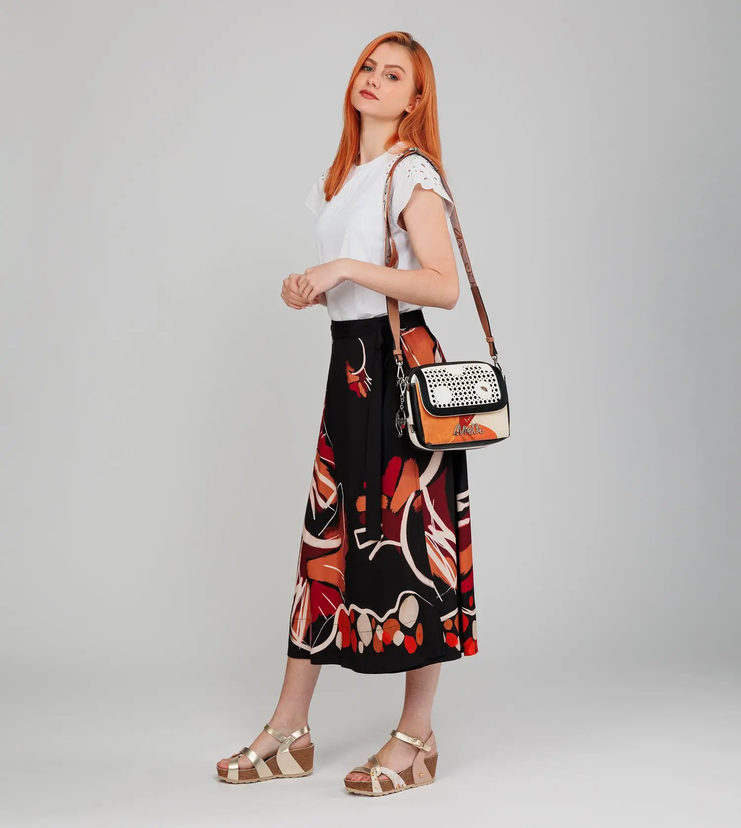 Bandolera de solapa ovalada Lunares